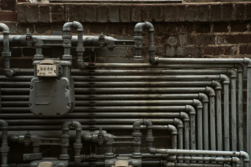 Gas line repair — technician testing a residential gas line