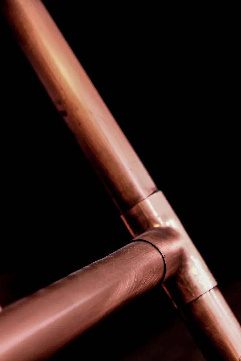 Piping & repiping — new copper and PEX water lines installed in a home
